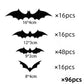 Peel and stick black PVC bat wall stickers laid out on a light surface