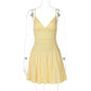 Lemon yellow drop-waist flared mini dress shown on a transparent mannequin