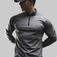 Half-zip sport shirt styled as a base layer under a jacket