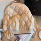 Quilted khaki jacket with a ribbed stand collar edged in a black stripe, varsity style