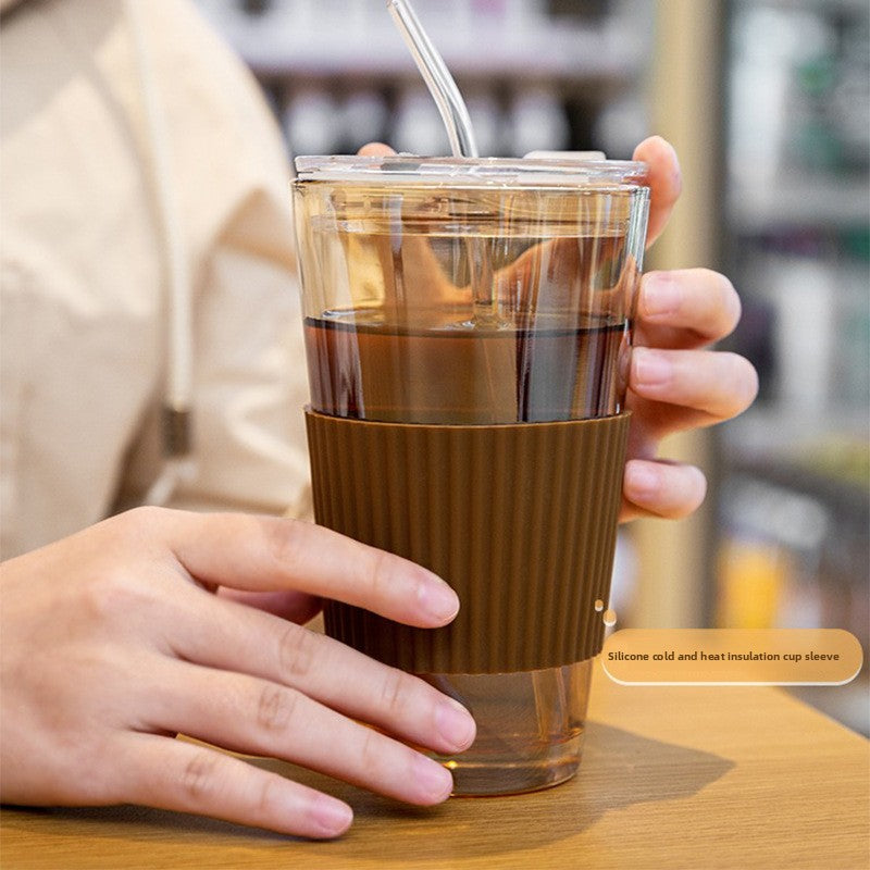 Detail of reusable glass straw through silicone lid gasket