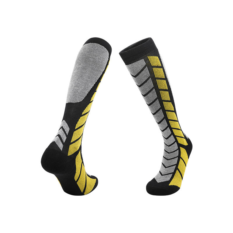 Long ski socks with a towel cushioned sole and an elastic cuff that holds the sock up