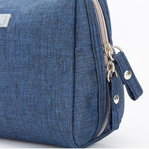 Water resistant toiletry bag with a wide top zip and a lined divided interior