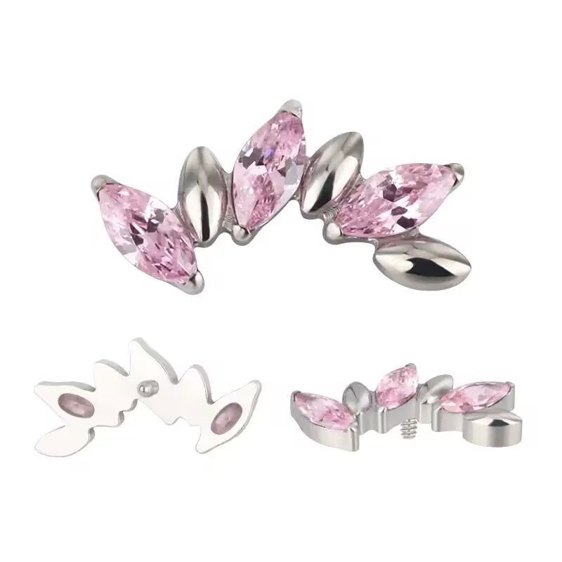 Curved marquise cubic zirconia top of a titanium piercing stud in close view