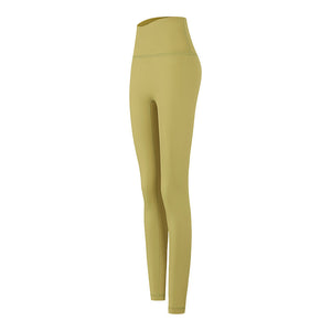 Women's high-rise yoga leggings with a wide waistband, worn on a plain studio backdrop