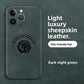 Dark night green sheepskin leather dragon phone case showing the central magnetic ring and totem