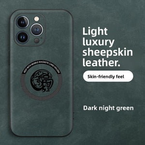 Dark night green sheepskin leather dragon phone case showing the central magnetic ring and totem