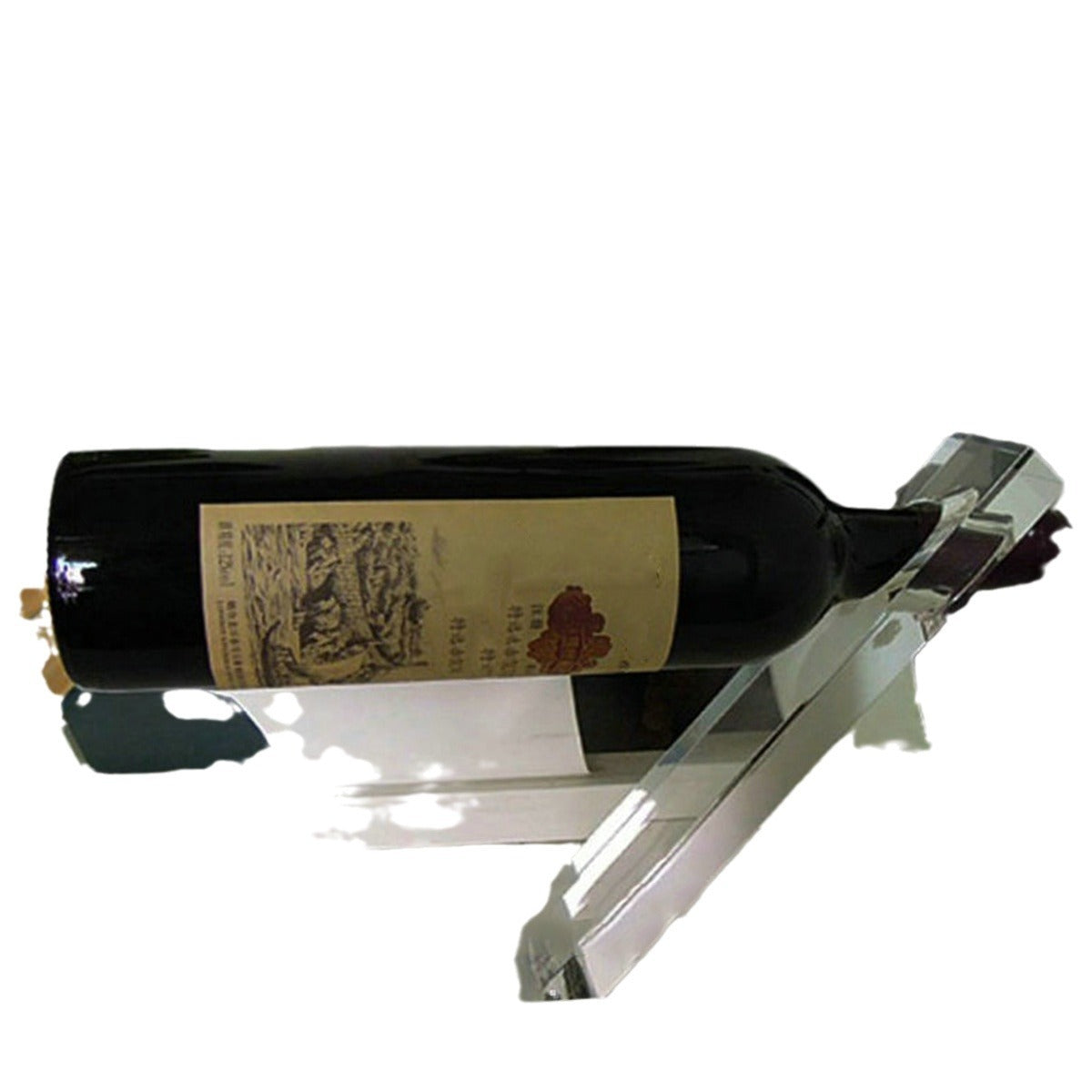 Red wine bottle held at an angle by a transparent acrylic holder on a white background