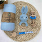 Crochet rattle and pacifier clip styled in an everyday baby scene