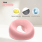 Pink memory foam face rest pillow with an open center, shown with the memory foam core and detachable cover