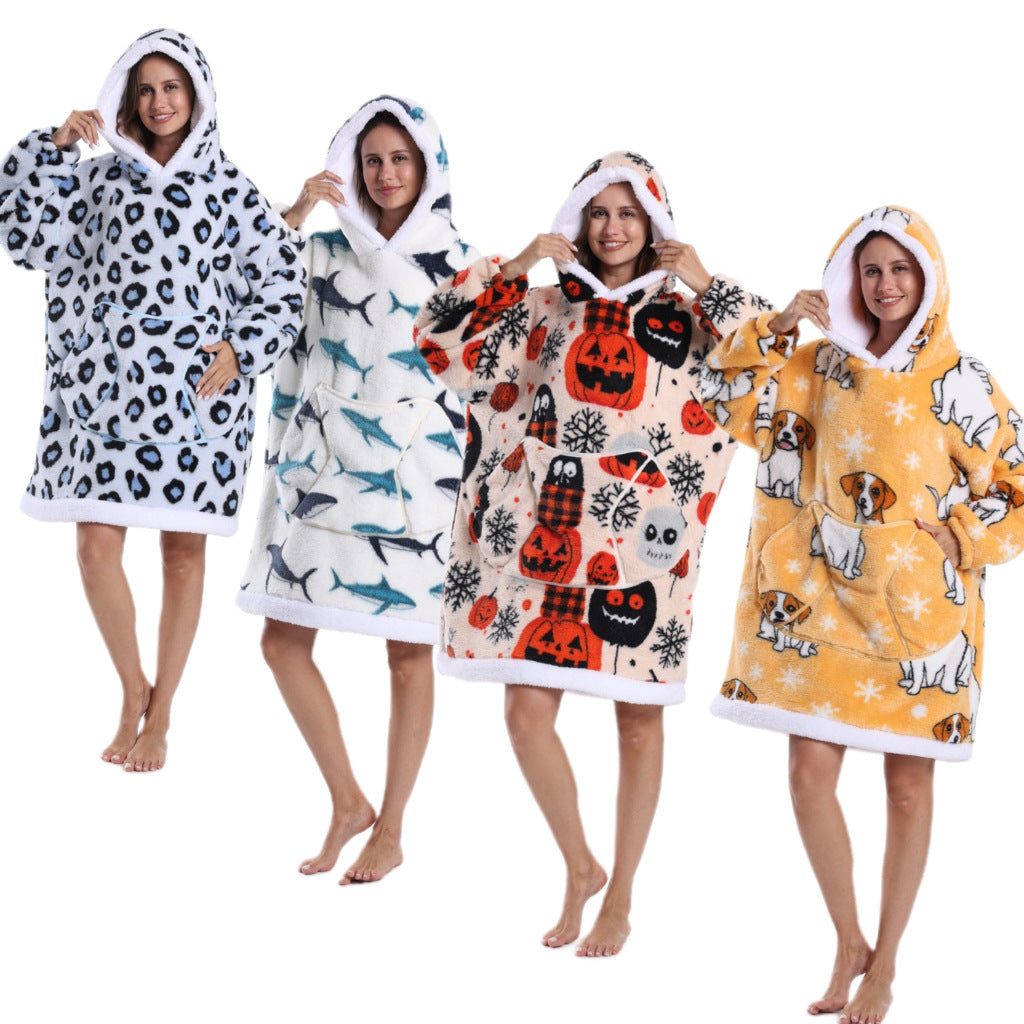 Four models wearing oversized hooded pullovers in leopard, shark, pumpkin and dog prints at 90 cm length
