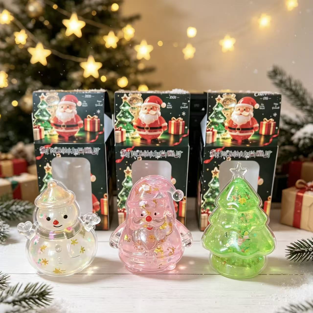 Jelly squishy snowman, Santa and Christmas tree squeeze toys in a row