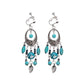 Bohemian vintage clip-on tassel drop earrings on a zinc alloy frame, handmade boho pair on white studio background
