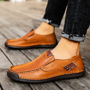 Close view of the hand stitched moccasin seam on a cowhide leather loafer