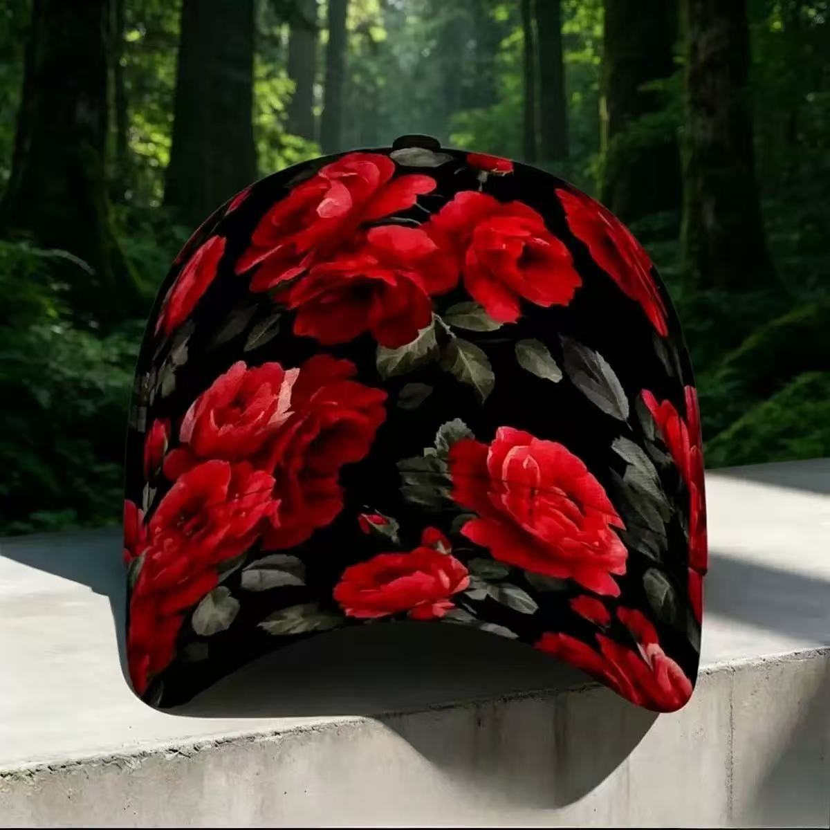 Floral digital print cap in a bright colourway on a light studio table