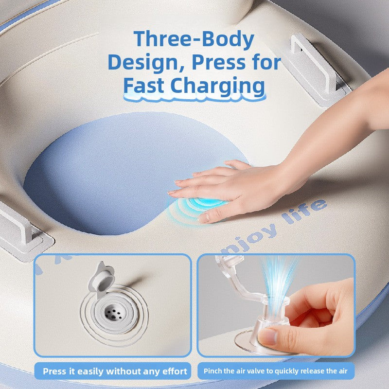 Hand pressing the inflation valve in the seat of a blue and white inflatable snow ring with a close view of the valve