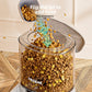 Gravity pet water dispenser with a clear tank refilling a bowl below