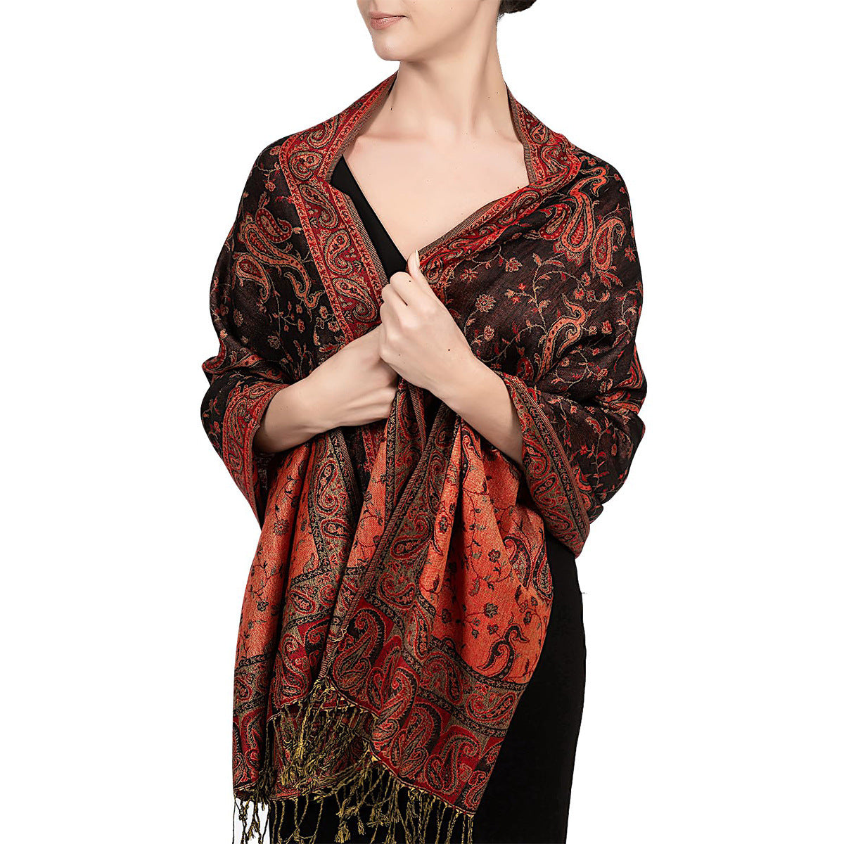 Red and rust paisley tassel shawl wrap worn draped over the shoulders with tasseled fringe ends