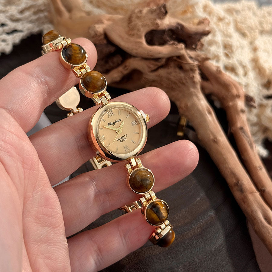 Womens quartz bracelet watch with round stone beads set in gold tone links