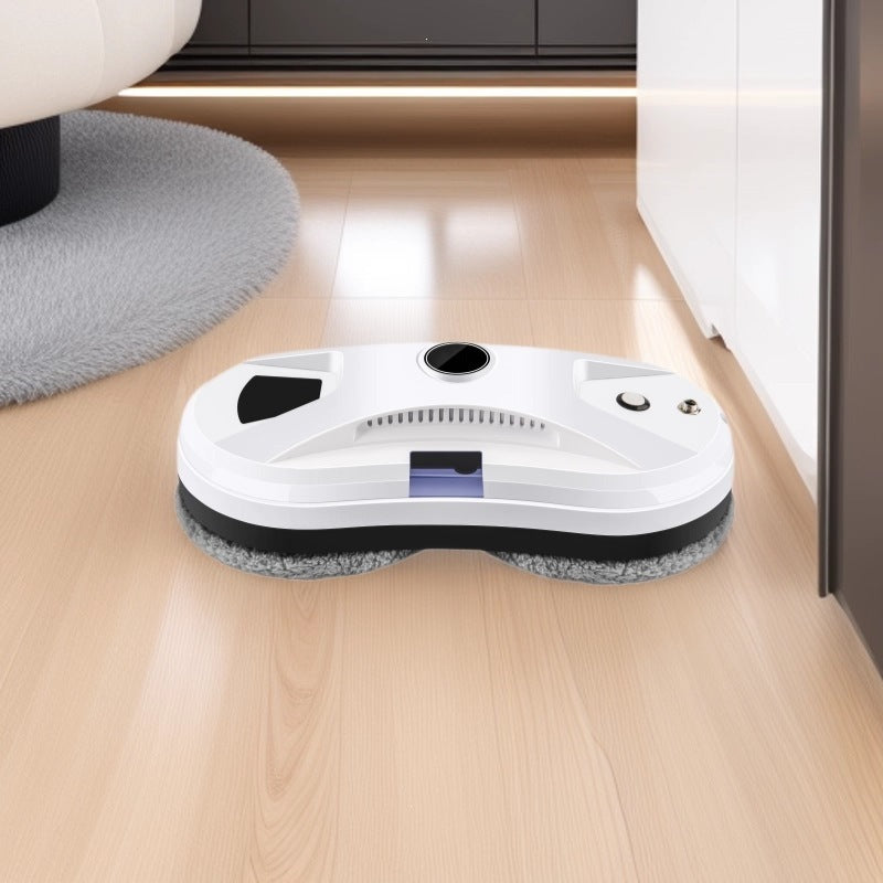 Window robot on glass showing twin microfiber cleaning pads underneath
