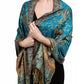 Teal blue paisley tassel shawl wrap worn draped over the shoulders with tasseled fringe ends