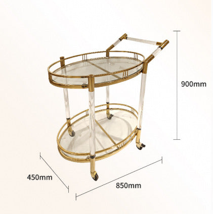 Golden stainless steel mobile serving cart with steering handle and four wheels