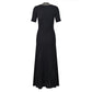 Black V-neck beaded dress worn in a lifestyle setting