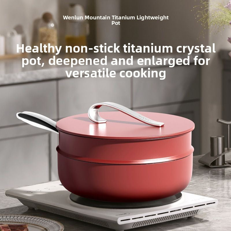 Bordeaux red 30 cm non-stick wok with matching lid and steamer tier on an induction cooktop in a kitchen