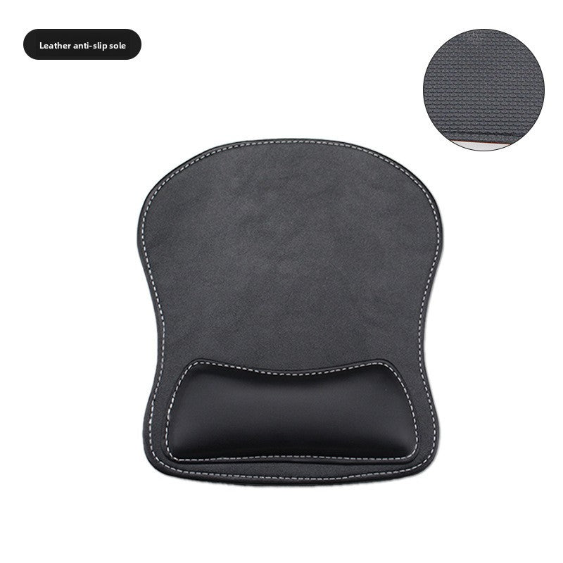 Light brown memory foam wrist rest mouse pad on a desk