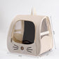 Cat carrier backpack with the top mesh flap unzipped to show cross flow ventilation above the clear dome