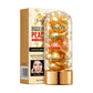 Gold placenta essence capsules in a bottle beside its gold box