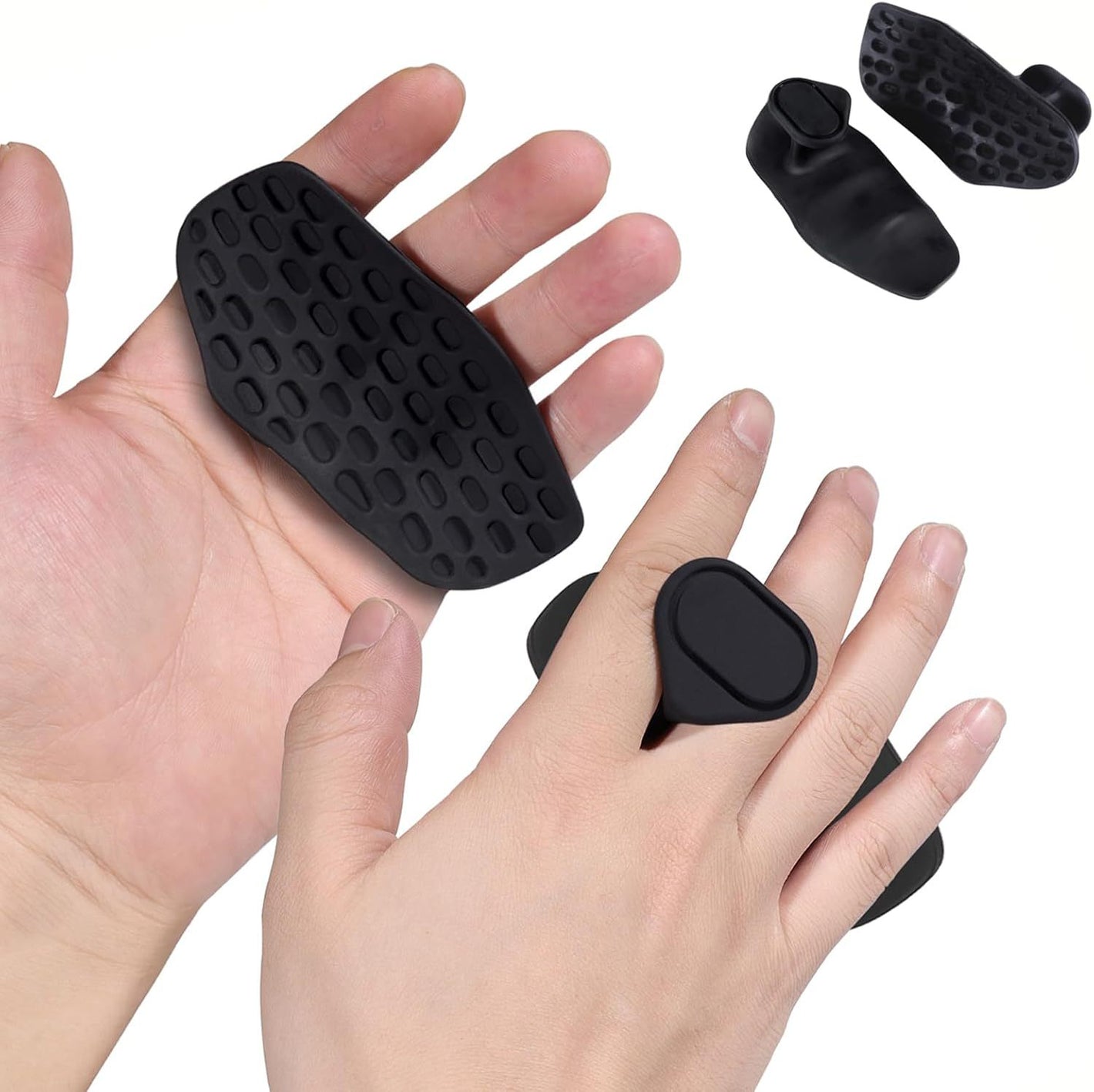 Soft black silicone hand grip pad resting in an open palm with the web piece