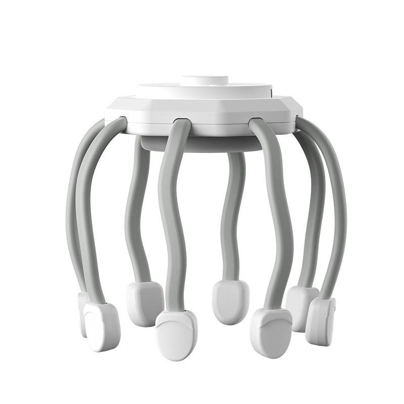 White scalp massager with grey flexible claws and white pads, round top without a carry loop