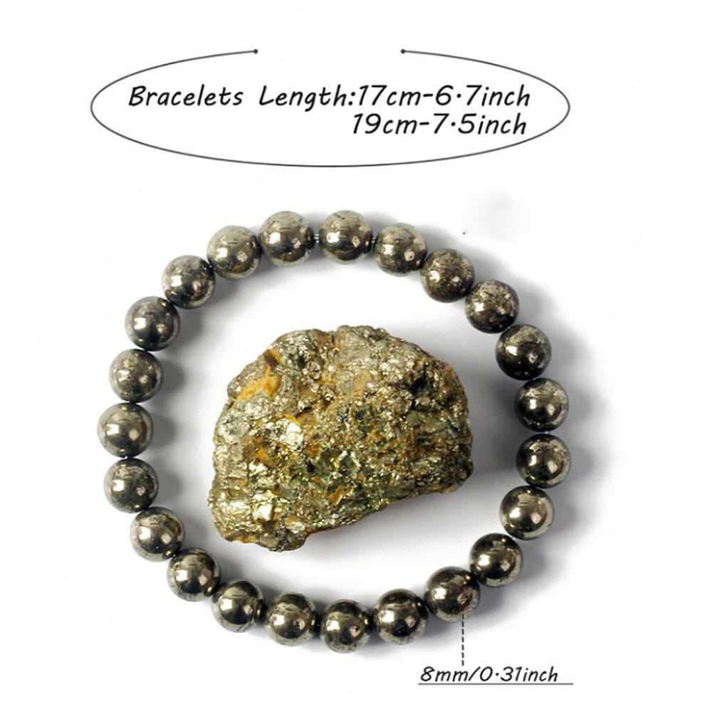 Pyrite crystal beaded bracelet worn on the wrist as a single stretch strand