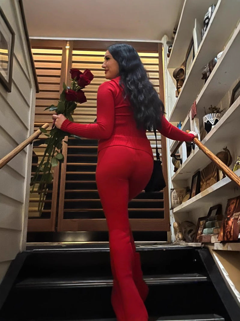 High waist ribbed knit pants shown on a model from the side