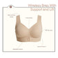 Black seamless support bra worn front on, showing the wide adjustable straps