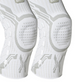 Close-up of the silicone patella pad and side support panels on the knee brace