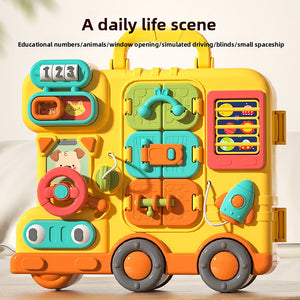 Yellow busy board bus with number reel, steering wheel, gears and animal flip window
