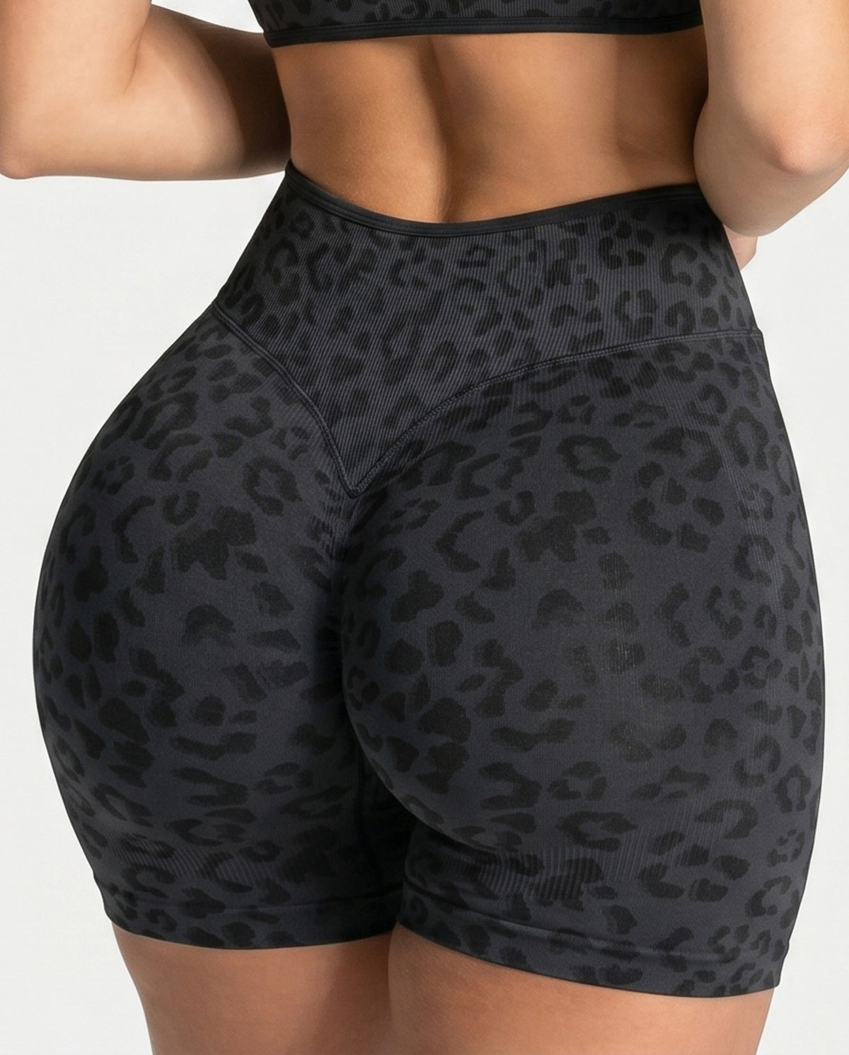 Black seamless high waist yoga shorts with a 3D leopard print and ribbed waistband, size S variant image