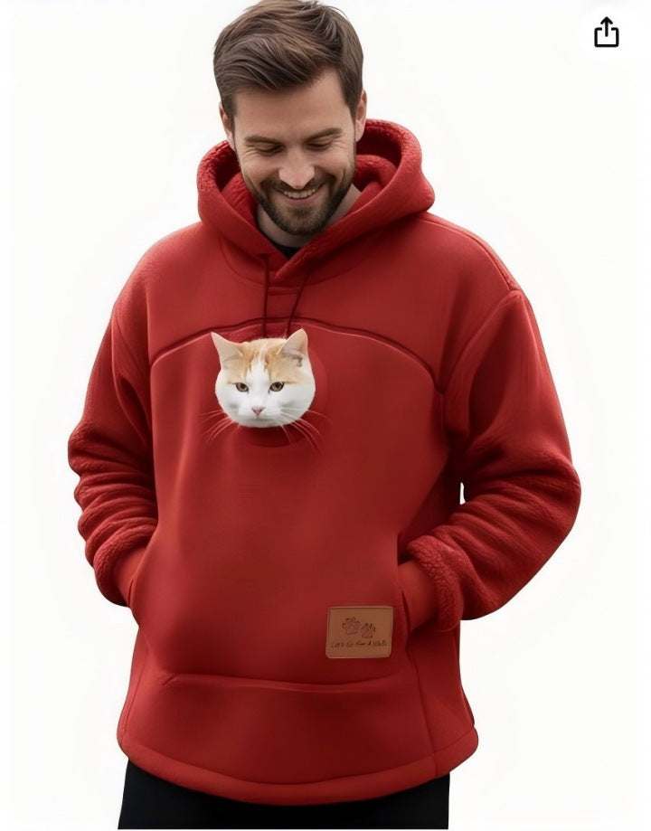Red fleece pet pouch hoodie front view on a man with a cat in the pouch