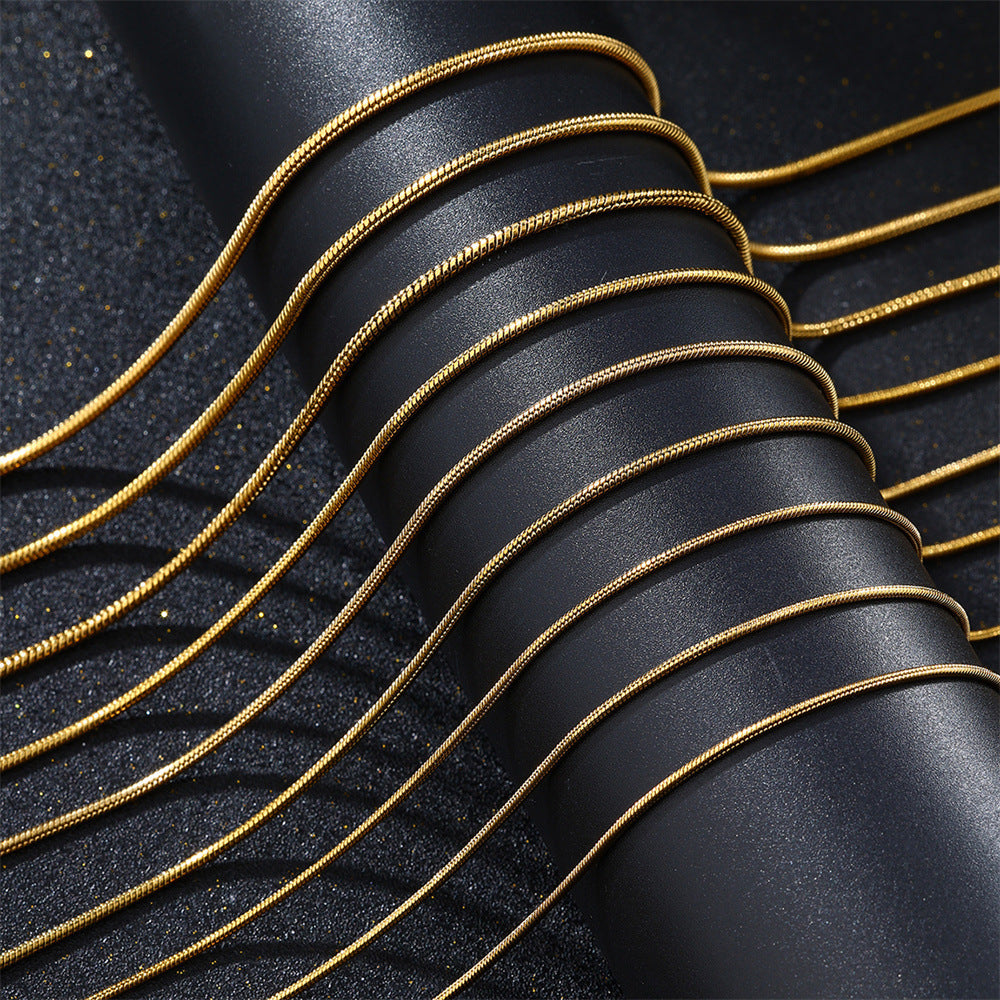 Snake bone chain necklace laid flat showing the smooth linked segments