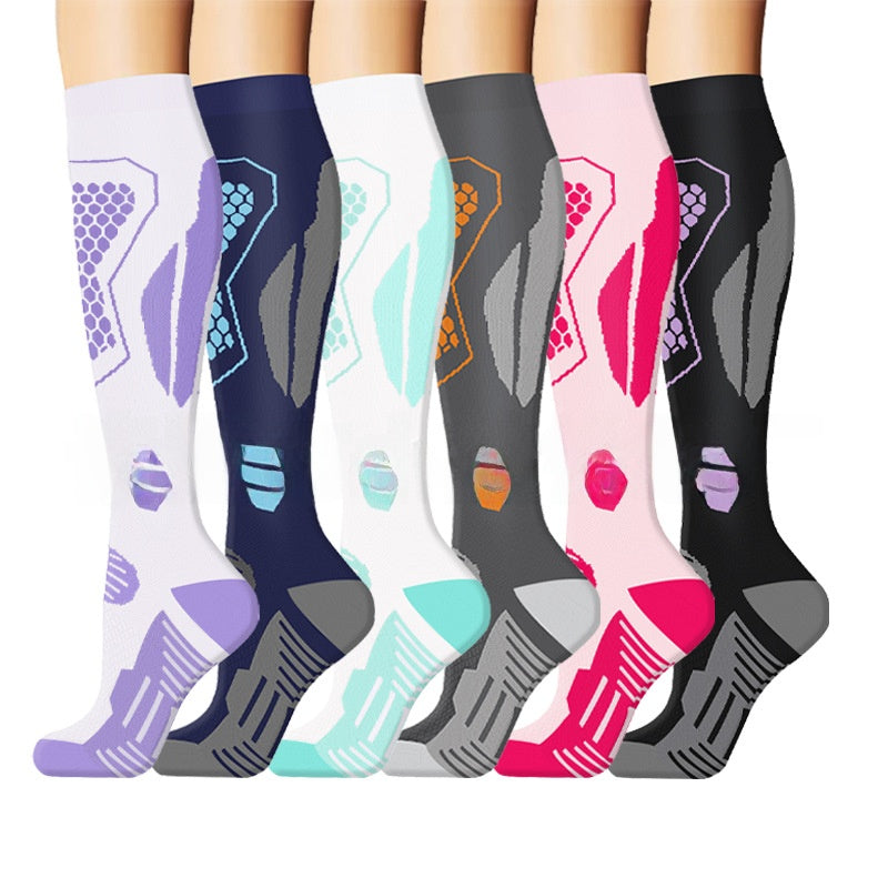 Knee high graduated compression sport socks displayed as a colour assortment
