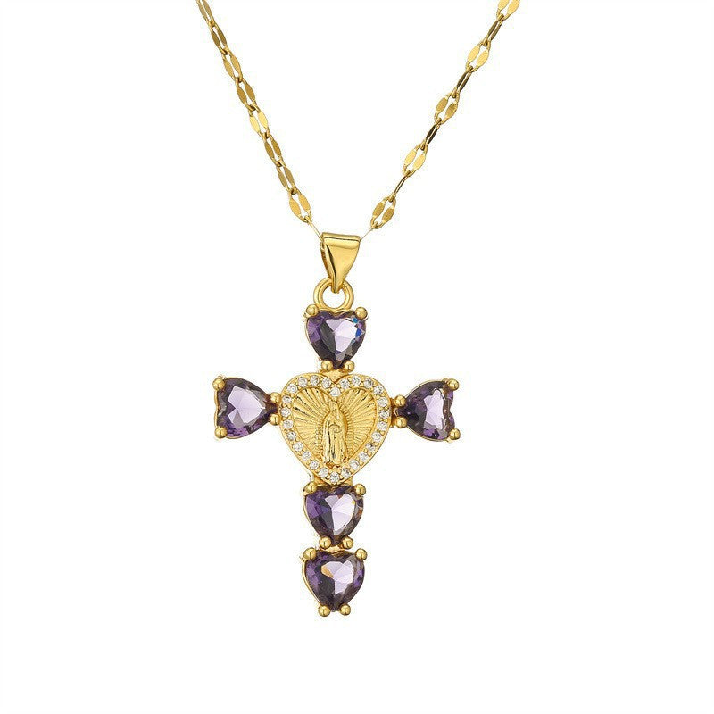 Colored cubic zirconia cross pendant necklaces with a central medallion on dark satin