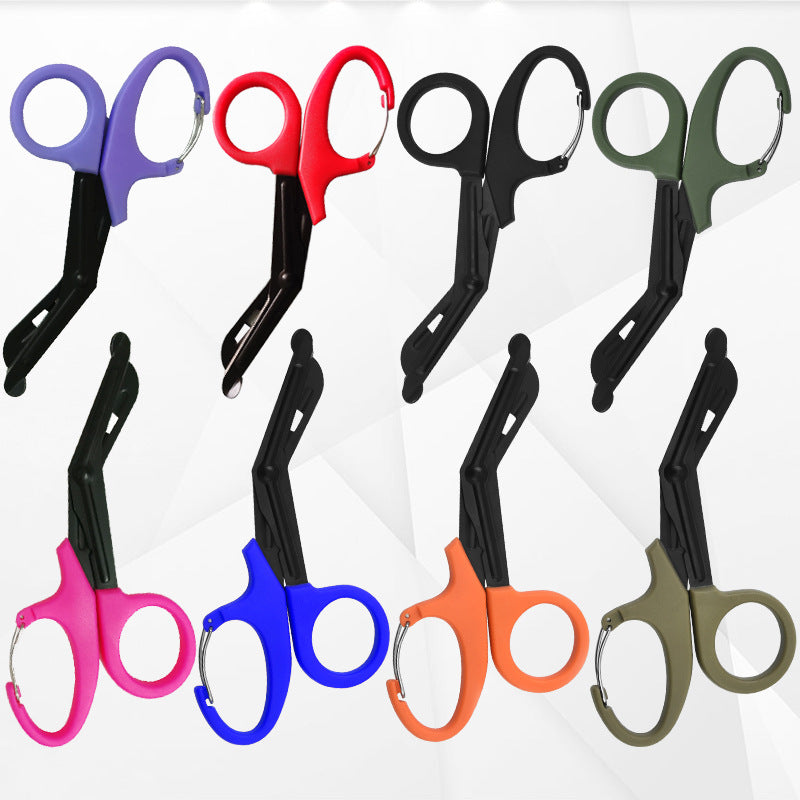Medical bandage scissors with angled handle and rounded tip