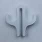 White resin double hook with an arm on each side, seen from the front on a light background