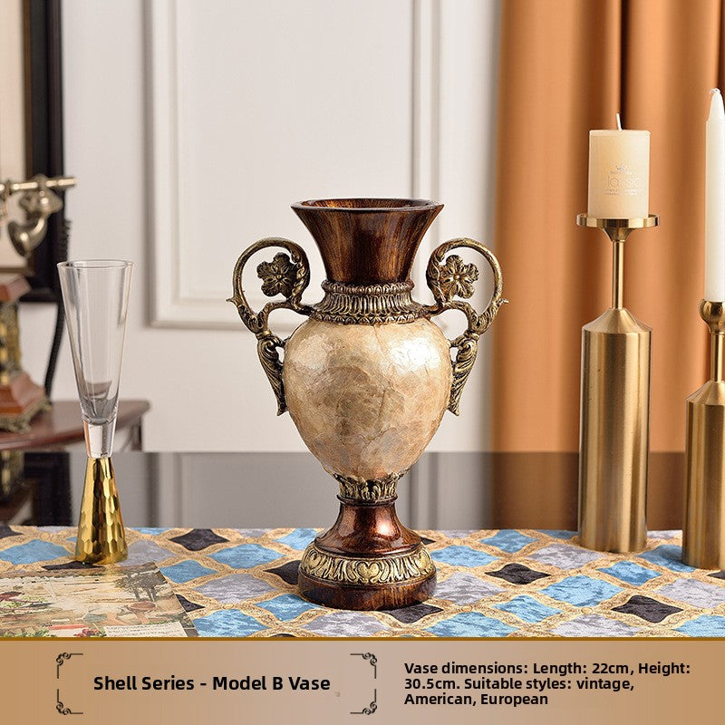 Vintage resin home decor with cream pearl shell inlay panels and molded gold tone European detailing