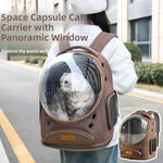Brown space capsule cat carrier worn on a woman's back with a cat in the clear dome (brown is not an option)