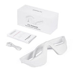 Portable eye massager placed on a desk ready for a quick break after screen time