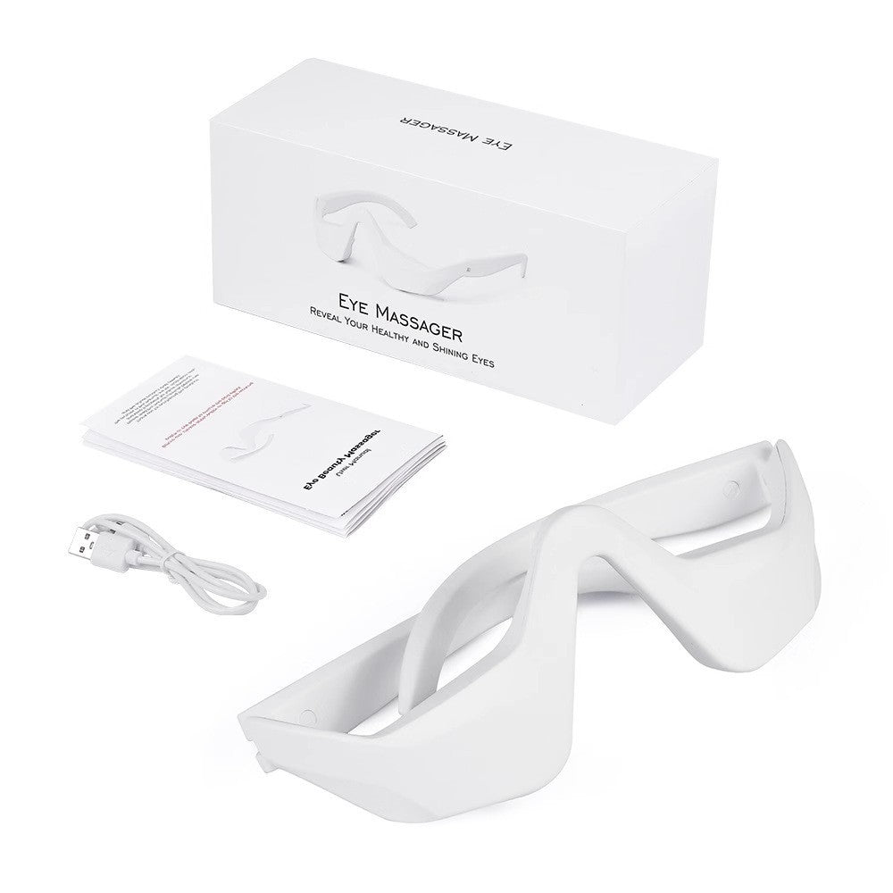 Portable eye massager placed on a desk ready for a quick break after screen time