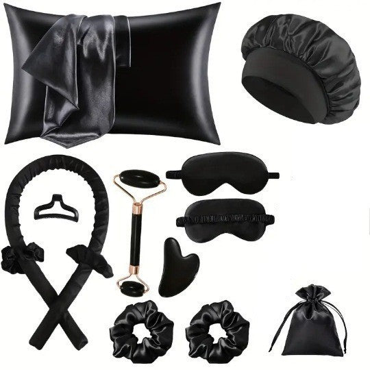 Black 12 piece set with pillowcase, bonnet, curling rod, clip, eye masks, scrunchies, face roller, gua sha and pouch